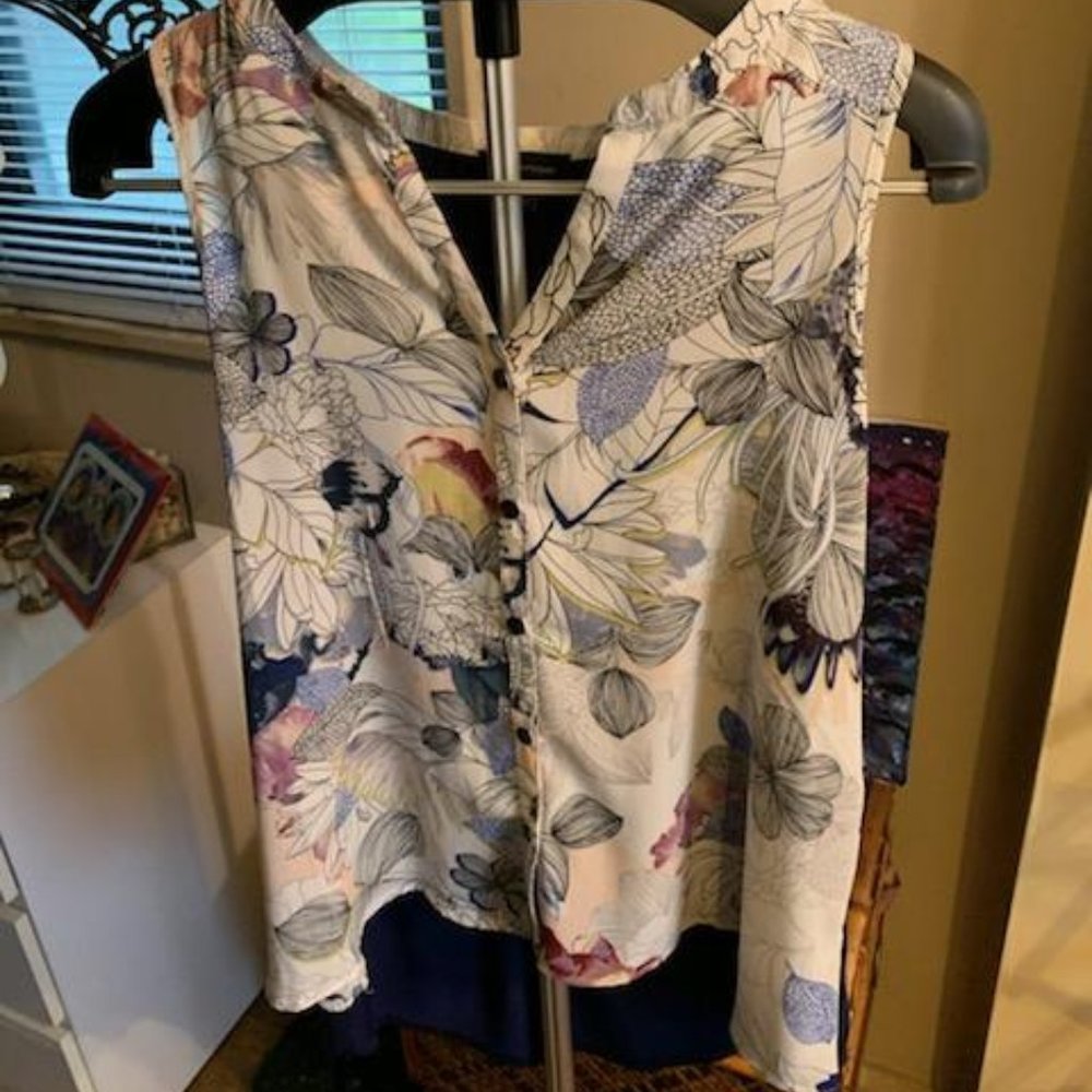 Floral Front Solid Navy Back Sleeveless Blouse